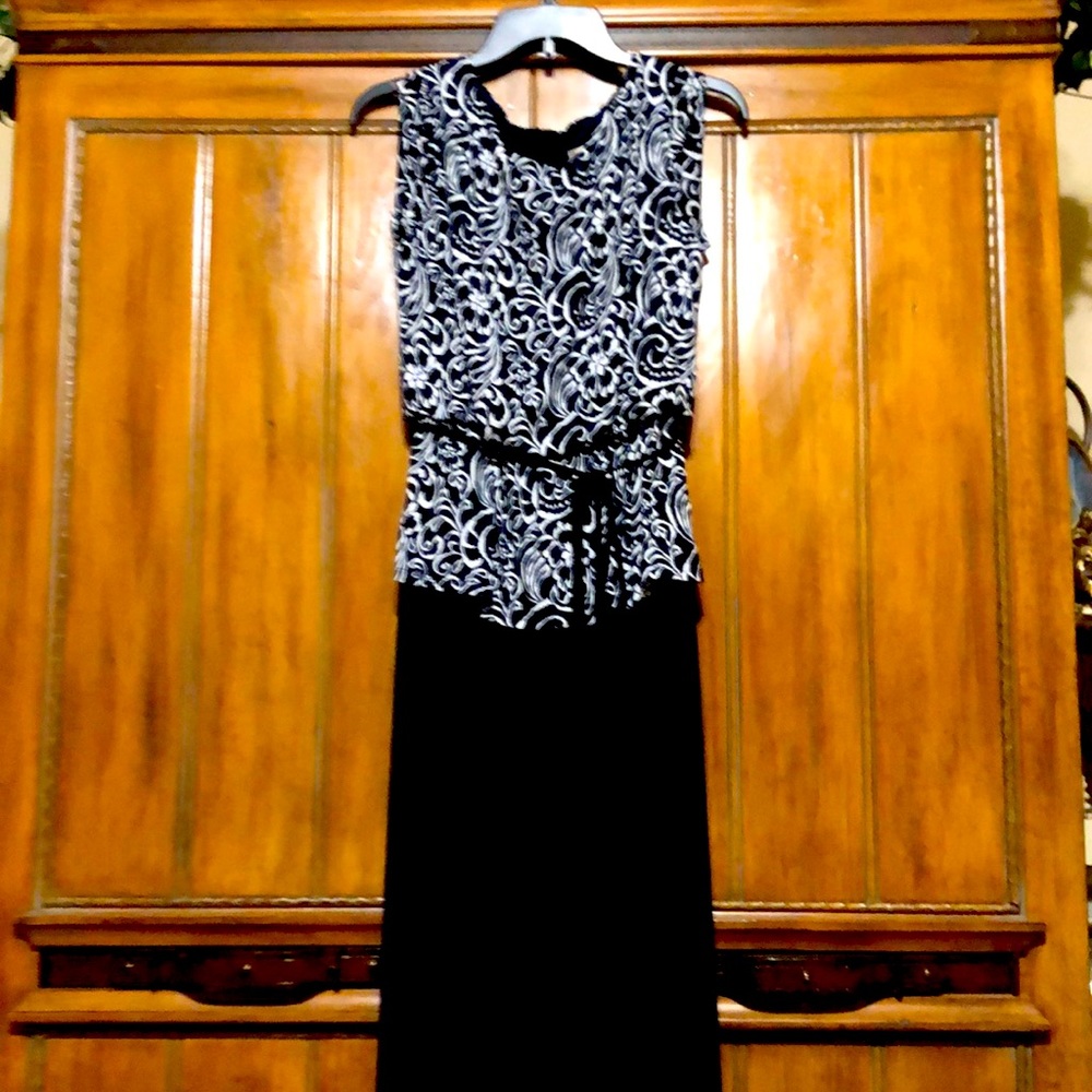Women’s Navy blue and white one piece pant suit.